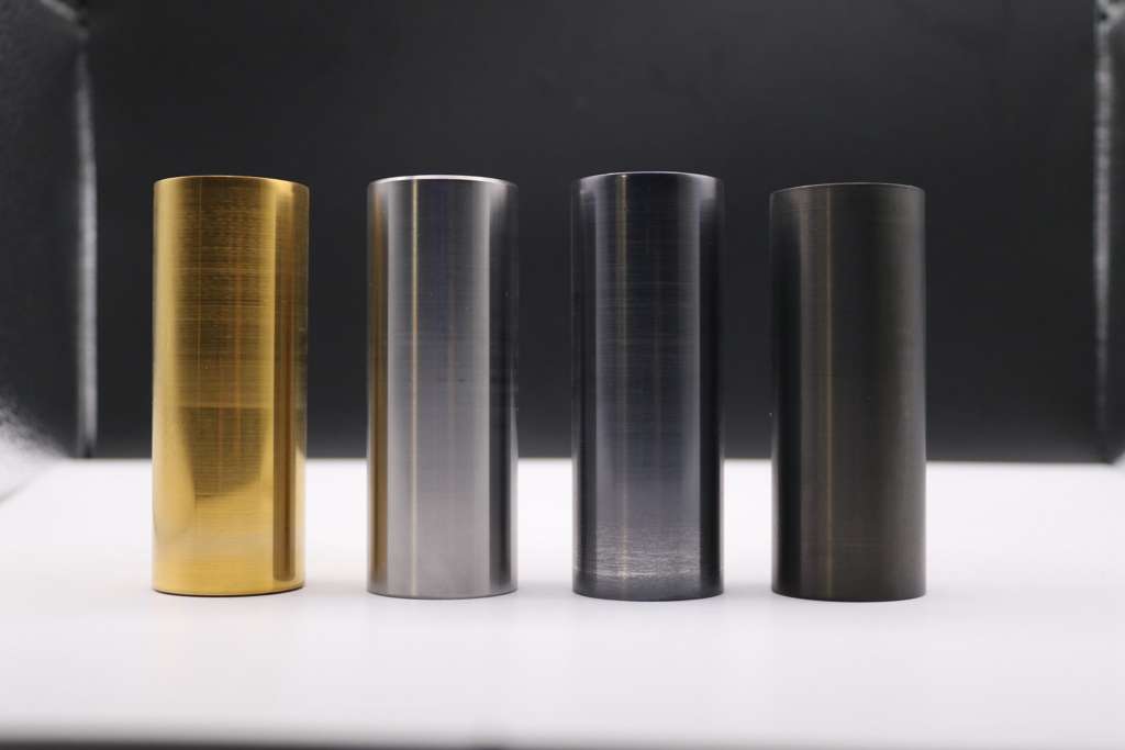 Four cylindrical advanced coatings samples showing TiN, CrN, AlTiN and DLC finishes.